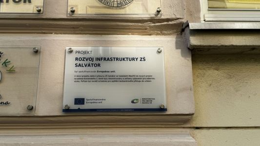 Glass sign with logo and description