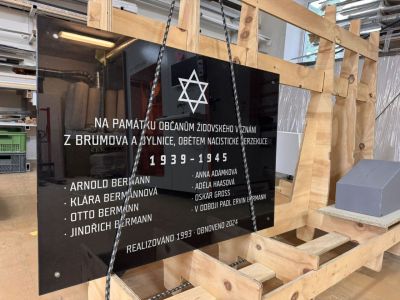 Glass plaque with logo and description