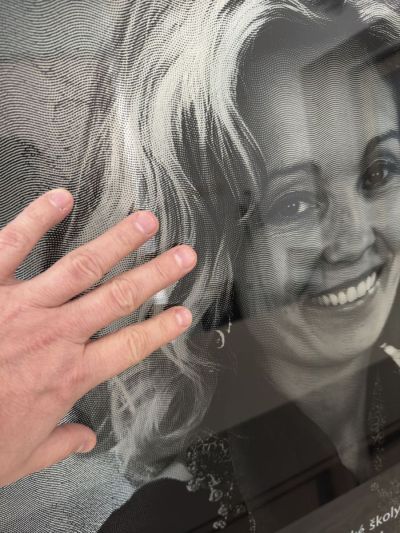 Glass memorial plaque with linocut